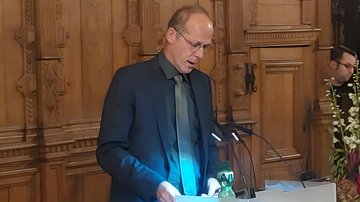 Grußwort von Senator Mark Rackles